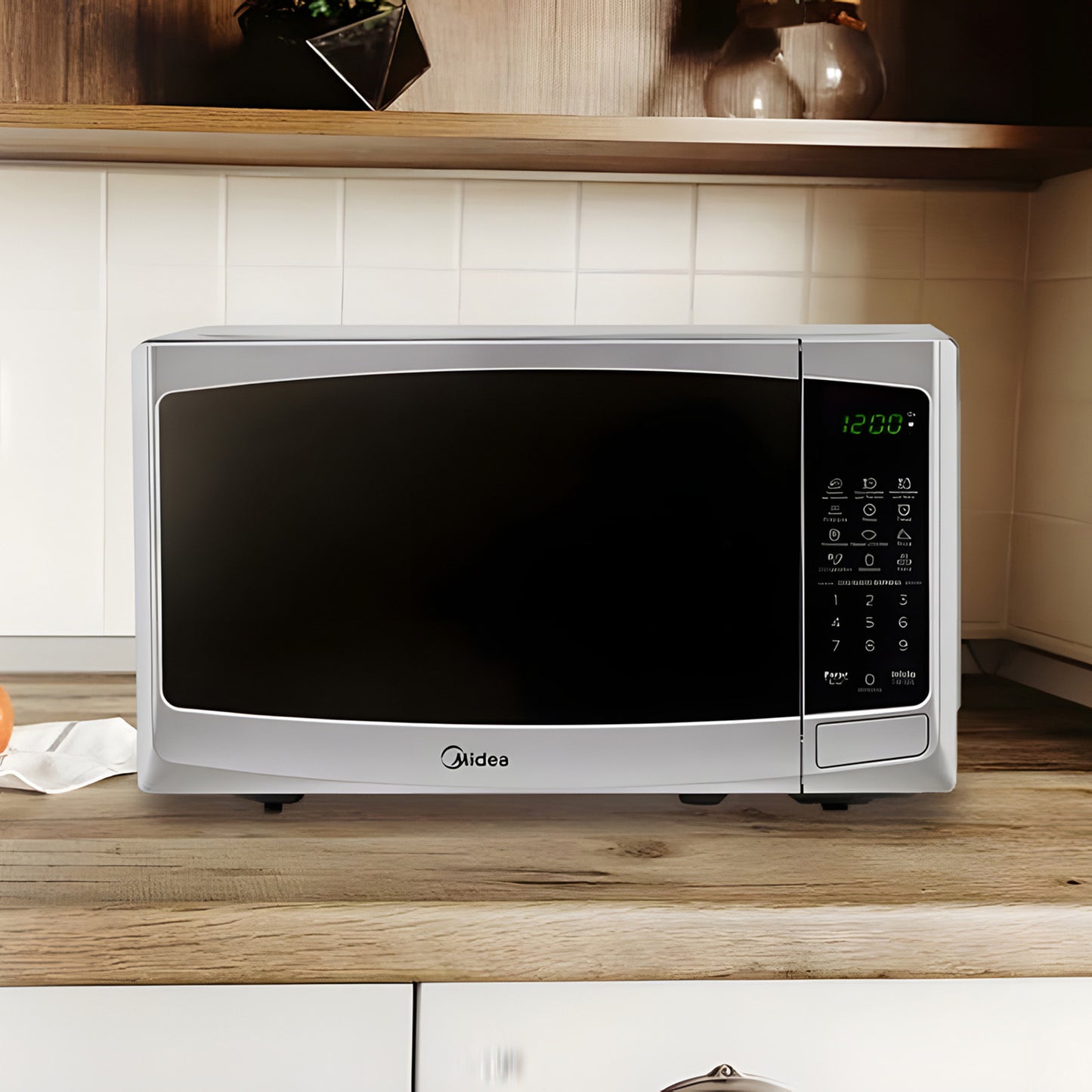 Horno de Microondas Midea 1.1 Pies Cúbicos Gris MMDP11S2BG